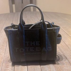 Marc Jacob’s leather mini tote bag in black. Dust bag included.